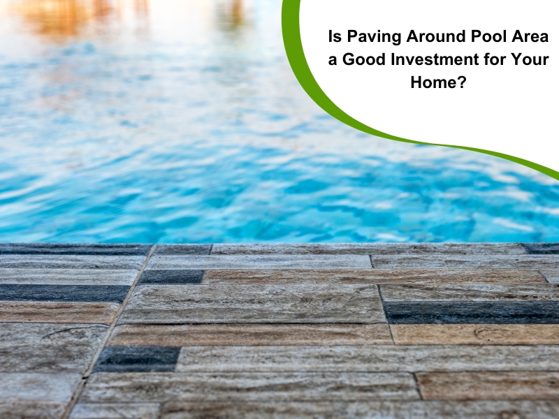 A close-up of paving around a pool area, showing textured tiles leading to blue water.