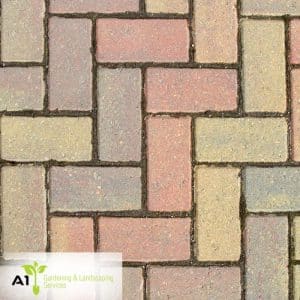 The image presents herringbone brick paving.