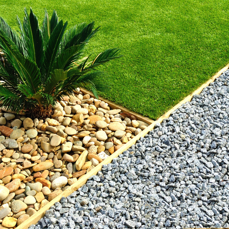 image presents river rock landscaping