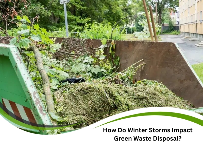 Overflowing green waste disposal bin with tree limbs and grass from storm cleanup.