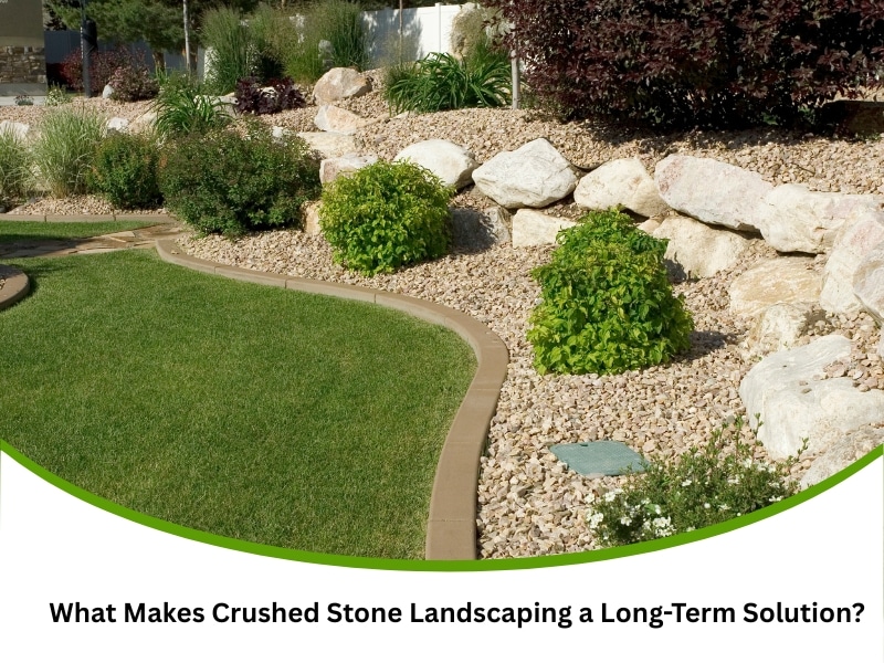Crushed stone landscaping around green lawn with rock edging and layered garden beds
