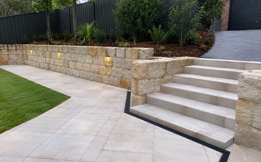 Paved driveway, path or retaining wall on a local block